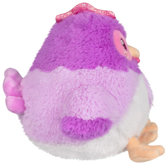 Side view of the Squishable Party Snacker Purple Hen 6-Inch Plush