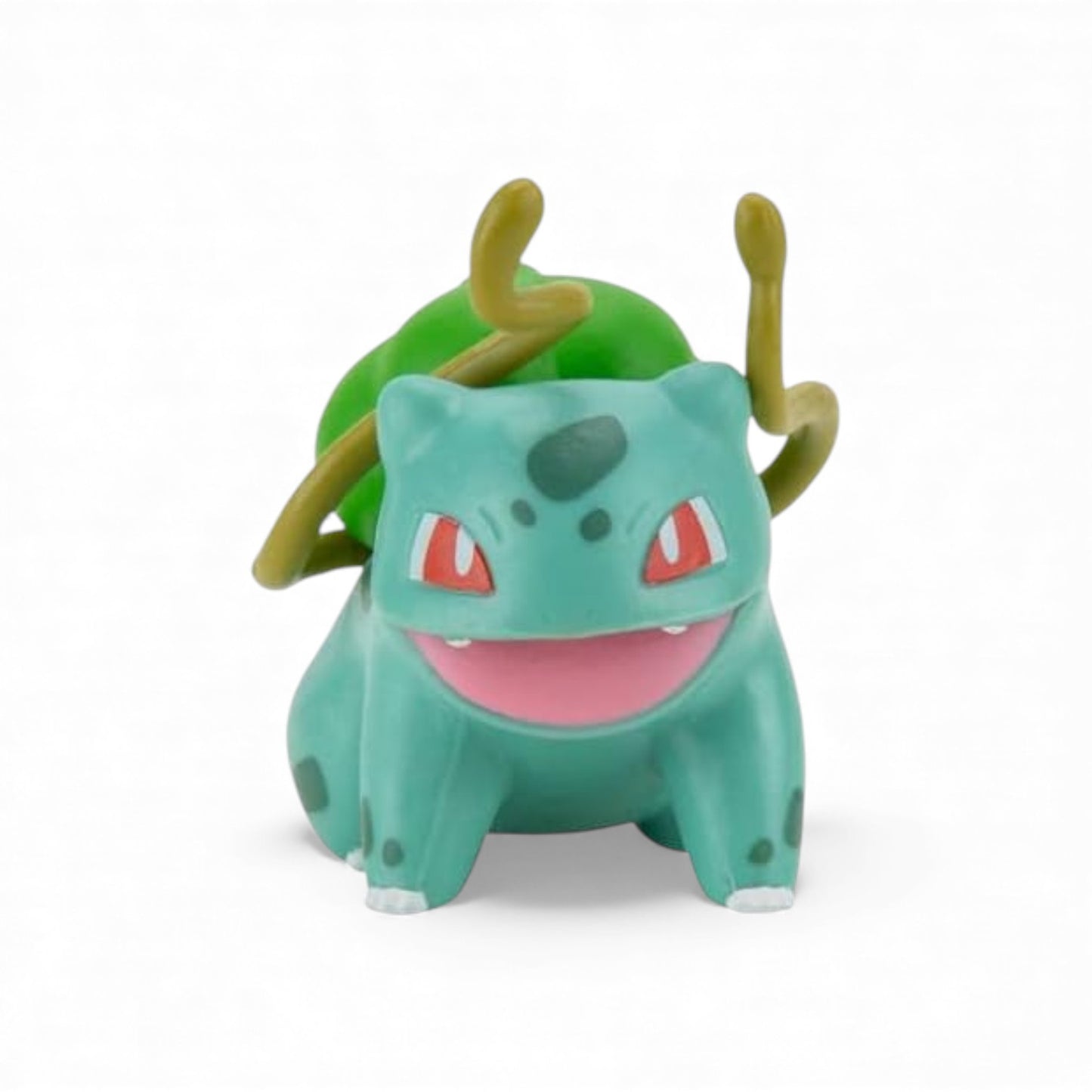 Green cartoon-like creature with red eyes on a white background