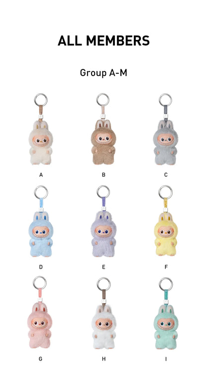 Set of small character keychains labeled A to I on a white background.