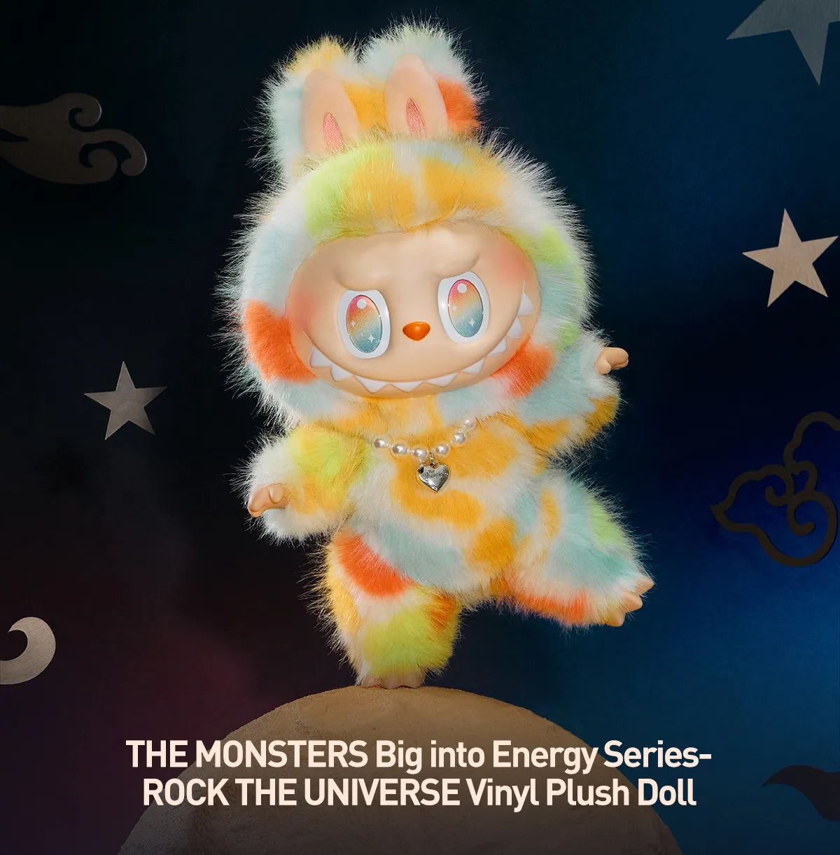 A product photo of the POP MART "Rock the Universe" Labubu, a large 14.57-inch vinyl plush doll with rainbow tie-dye fur and a pearl heart necklace with a starry night background.