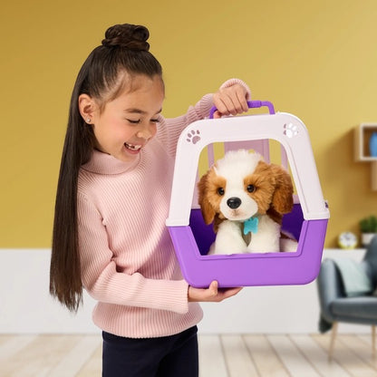 Child holding a purple toy pet carrier with Little Live Pets My Really Real Puppy Patches interactive plush Canada inside against a yellow wall.