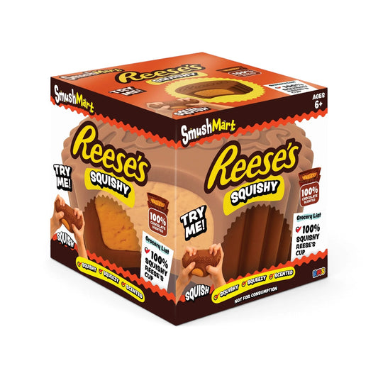 An authentic RMS Crazy Fun SmushMart Reese's Cup squishy fidget toy packaged in a branded brown and orange display box.