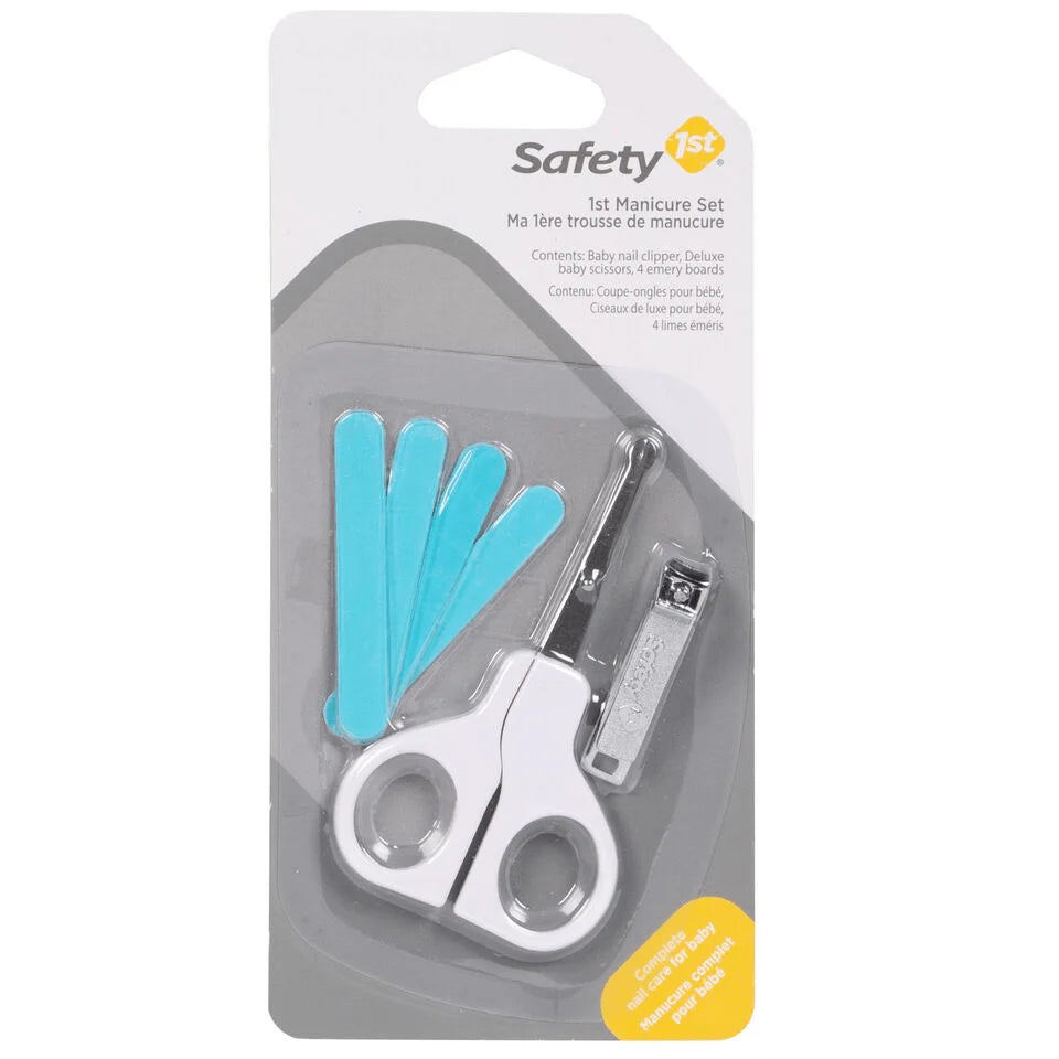 Safety 1st 1st Manicure Set featuring white baby safety scissors, nail clippers, and four turquoise emery boards in retail packaging.