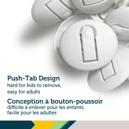 Close-up of Safety 1st Secure Press white outlet plug protectors in a 12-pack retail blister card with push-tab design.