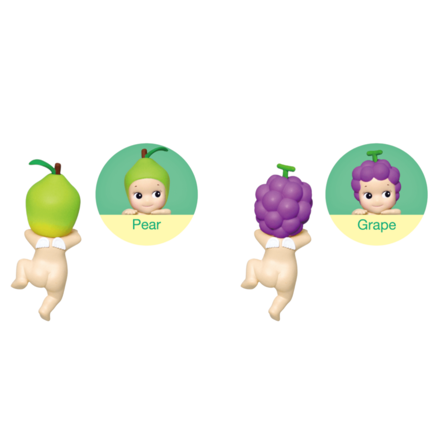 Two toy figures resembling a pear and a grape with faces on a white background.