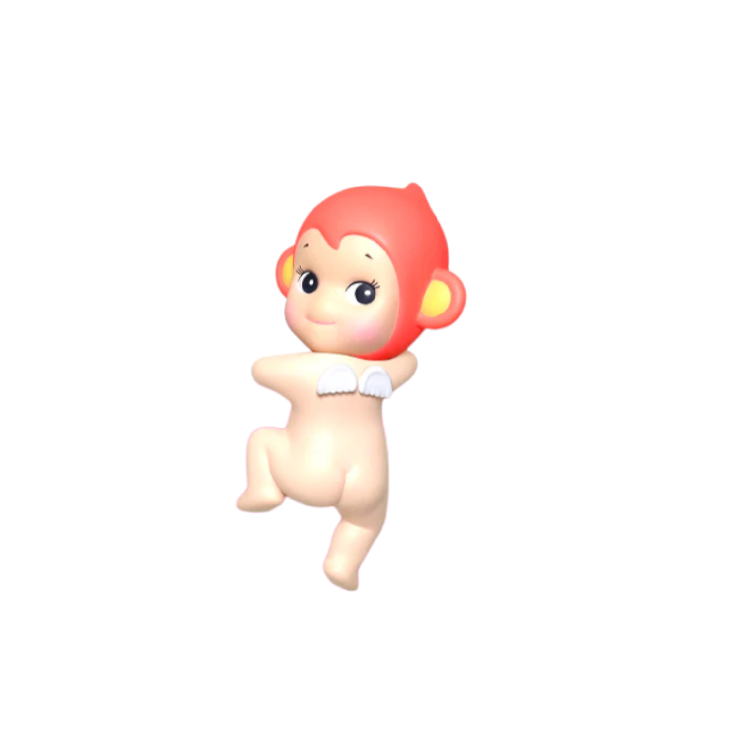 Toy figure of a baby with red monkey cap on a white background