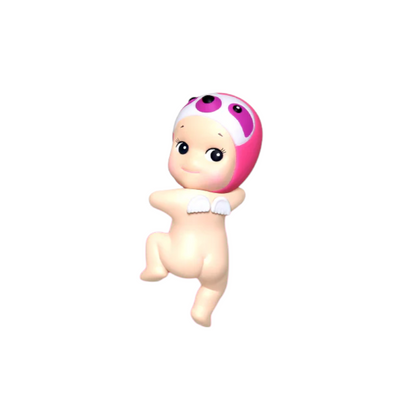 Toy figure of a baby with a pink sloth cap on a white background