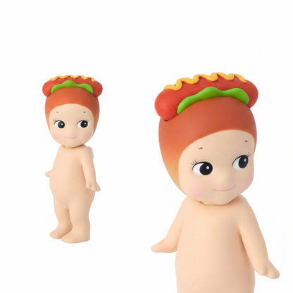 Two toy figures with hot dog hats on a white background