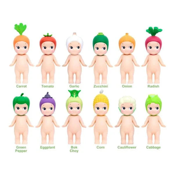 Set of 12 small dolls with vegetable-themed hair colors on a white background
