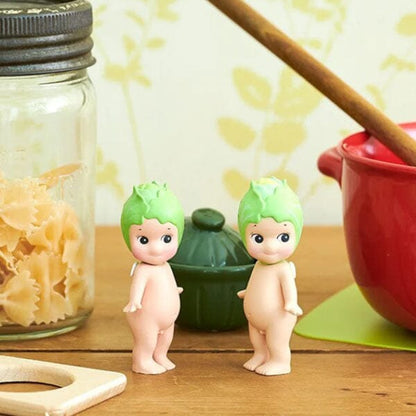 Sonny Angel Vegetable Series mystery blind box mini figure featuring cherub characters wearing various vegetable headgear.