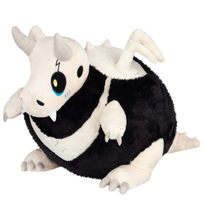 Squishable Bone Dragon Plush toy resembling a black and white dragon with large eyes on a white background