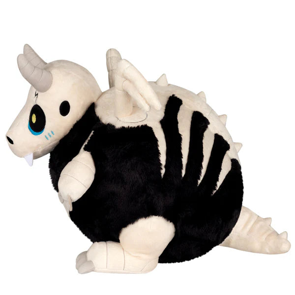 Squishable Bone Dragon Plush toy resembling a black and white dragon with horns on a white background