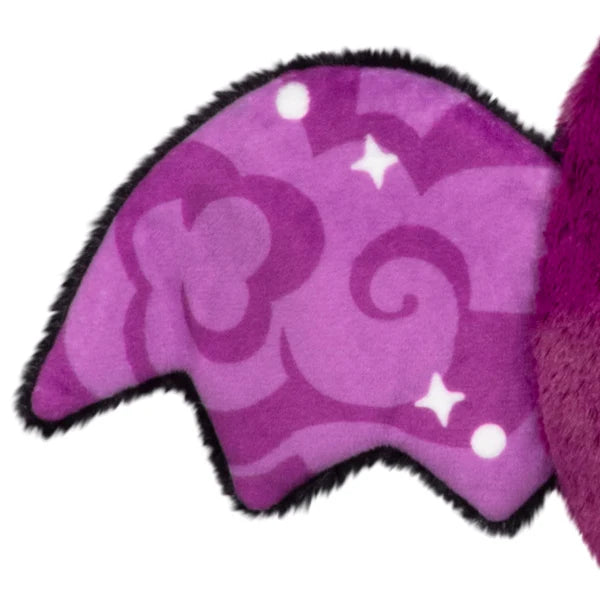 Squishable Alter Egos Series 21 Poison Mothman plush featuring deep magenta fur, glowing pink eyes, and black wings with pink embroidery.