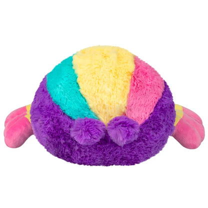 Squishable Mini Rainbow Spider plush with a colorful segmented body, eight striped legs, and big purple sparkling eyes.