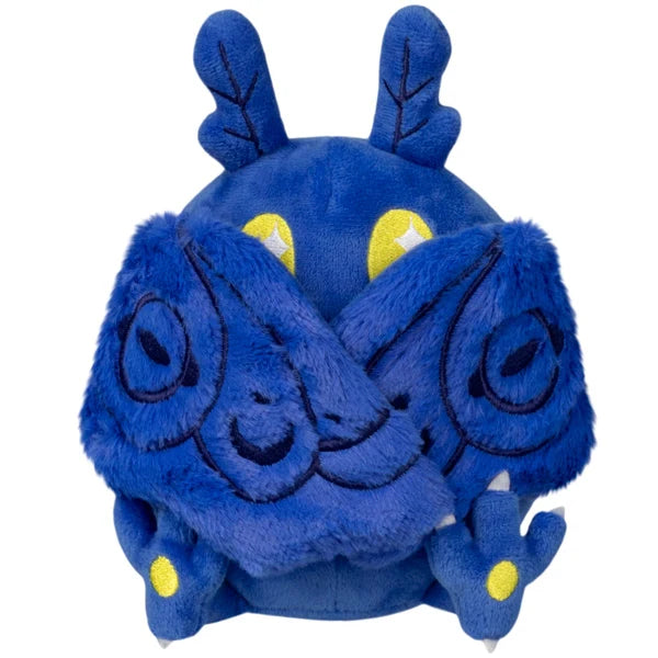 Squishable Snacker Blue Mothman S1E3 limited edition plush featuring deep blue fur, embroidered wings, and bright yellow eyes.