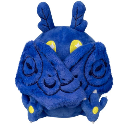 Squishable Snacker Blue Mothman S1E3 limited edition plush featuring deep blue fur, embroidered wings, and bright yellow eyes.