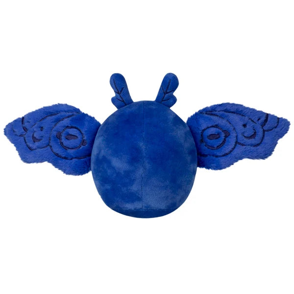 Squishable Snacker Blue Mothman S1E3 limited edition plush featuring deep blue fur, embroidered wings, and bright yellow eyes.