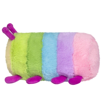 Squishable Snacker Rainbow Caterpillar S1E5 Limited Edition plush with pastel rainbow segments, magenta antennae, and small legs.