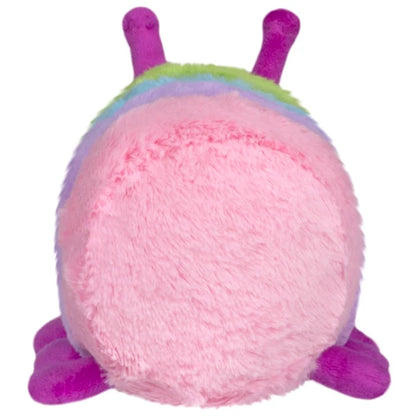 Squishable Snacker Rainbow Caterpillar S1E5 Limited Edition plush with pastel rainbow segments, magenta antennae, and small legs.