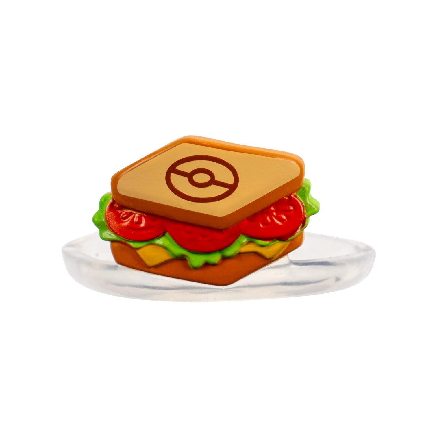 Sandwich with a Poké Ball design on the bread on a white plate.