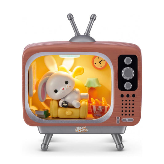 Small vintage-style television with a rabbit toy inside on a white background