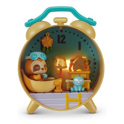 Toy alarm clock with a sleep-themed scene featuring a monkey and a blue creature.