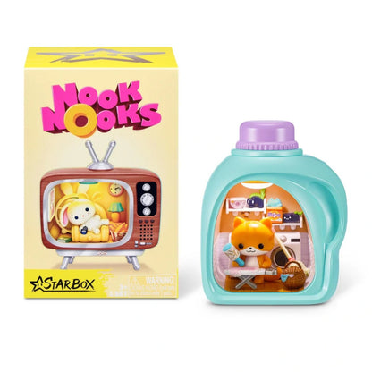 Nook Nooks toy packaging with a yellow box featuring a TV graphic and a blue toy figure.