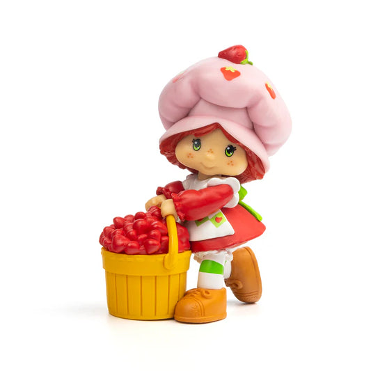 Strawberry Shortcake CheeBee 2.5-inch collectible retro figure with pink hat and red dress, sweetly scented.