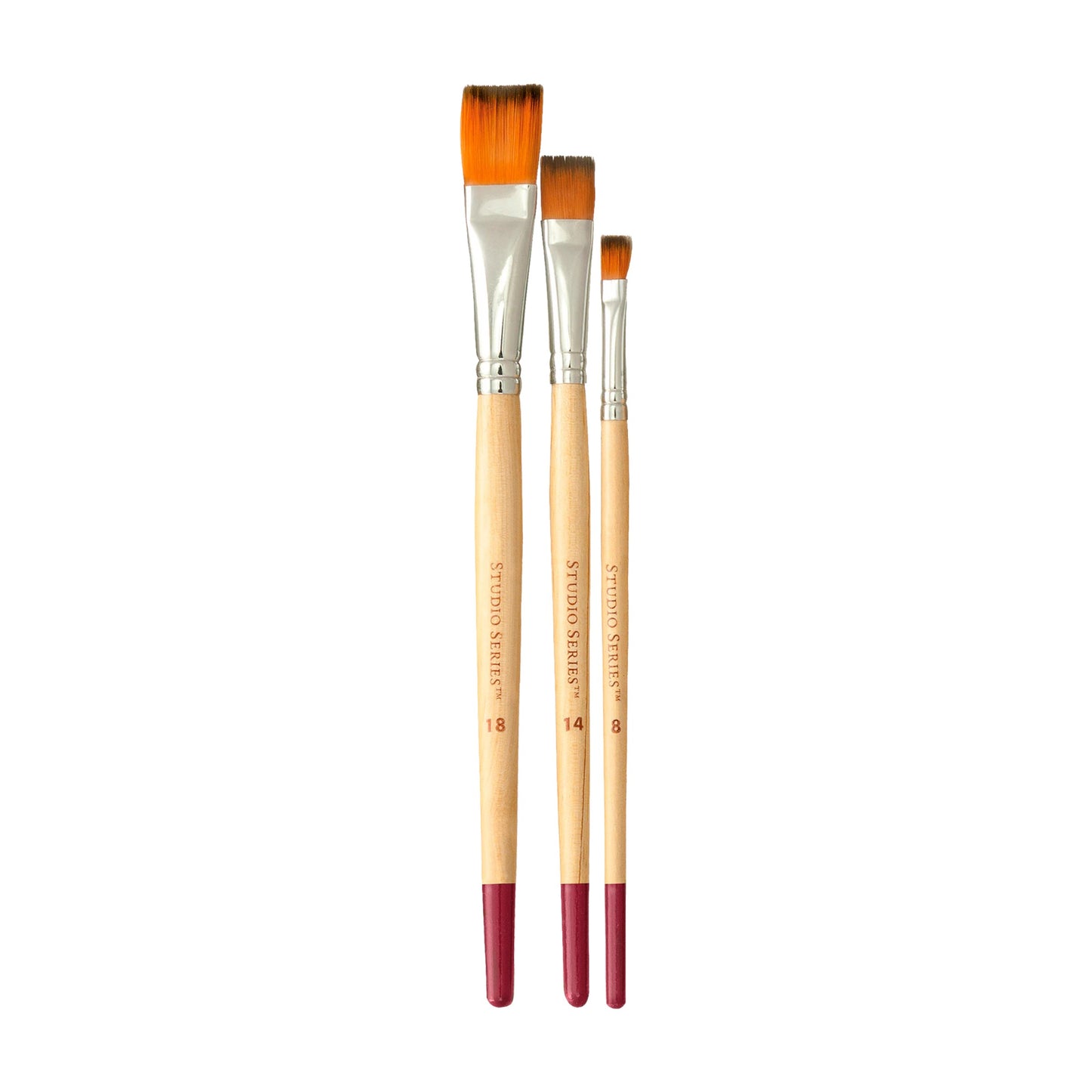 Three paintbrushes with wooden handles and red ferrules on a white background