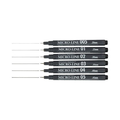 Studio Series 6-Piece Micro-Line Pen Set in a transparent reusable storage case, featuring six fine-line black pigment ink pens in various sizes.