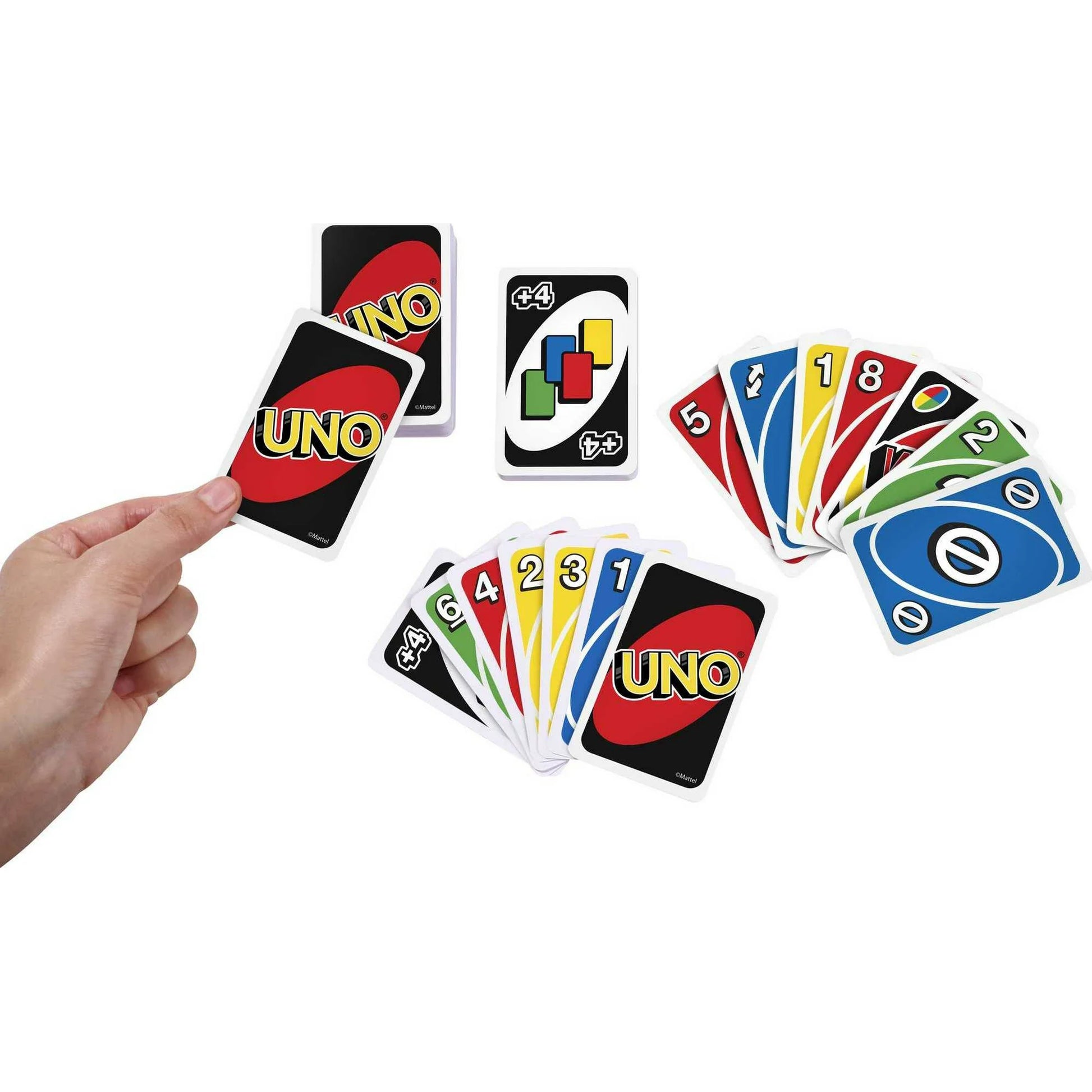 Hand holding UNO cards against a white background