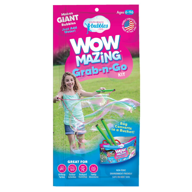 Wow Bubbles Grab-n-Go kit packaging with a girl blowing bubbles on a grassy background