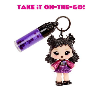 Keychain with a character holding a purple cylindrical object on a white background with text 'TAKE IT ON-THE-GO!'.