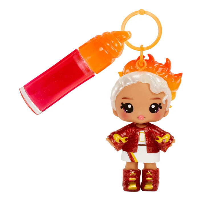 Toy figure with fiery hair and a red and orange outfit, holding a lighter.