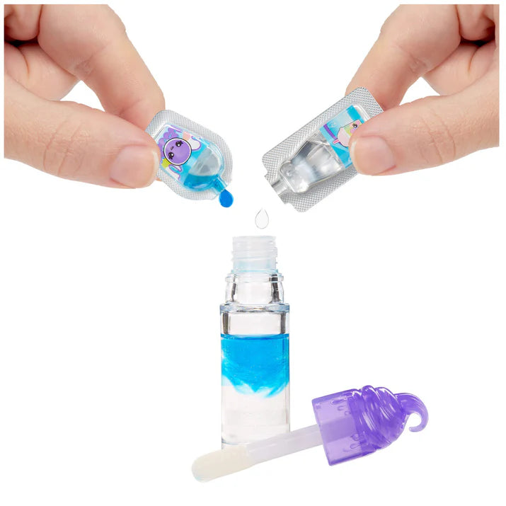 Small bottle with blue liquid, dropper, and packaging held by hands on a white background