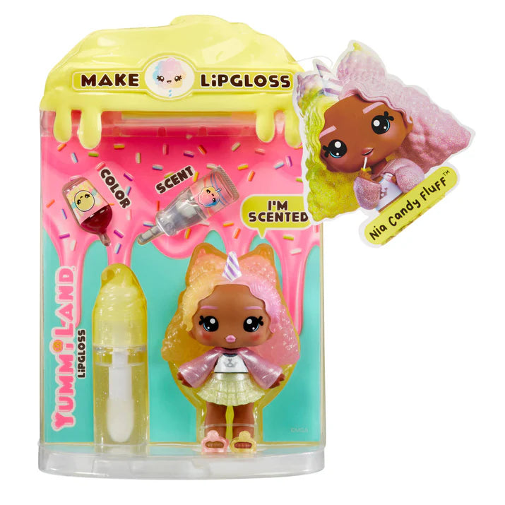 Toy lip gloss set with a doll in packaging, featuring colorful text and graphics.