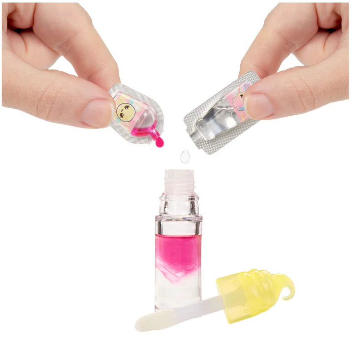 Small bottle with pink liquid, dropper, and applicator held by hands on a white background