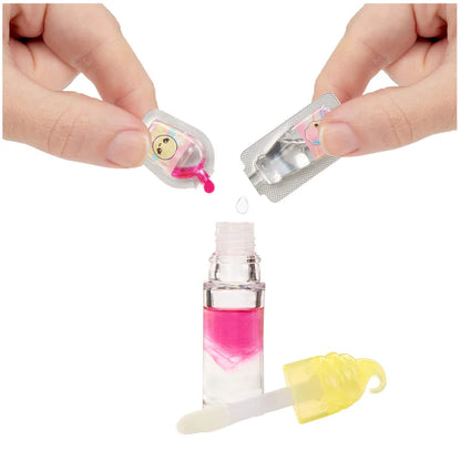 Small bottle with pink liquid, dropper, and applicator held by hands on a white background