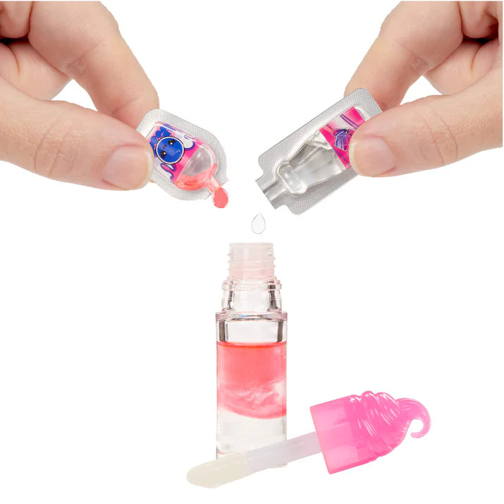 Hand holding a small cosmetic product with a pink and white design on a white background