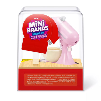 ZURU Mini Brands Magic Cook Kitchen Series 1 working pink mini stand mixer playset with a mixing bowl and slime ingredients.